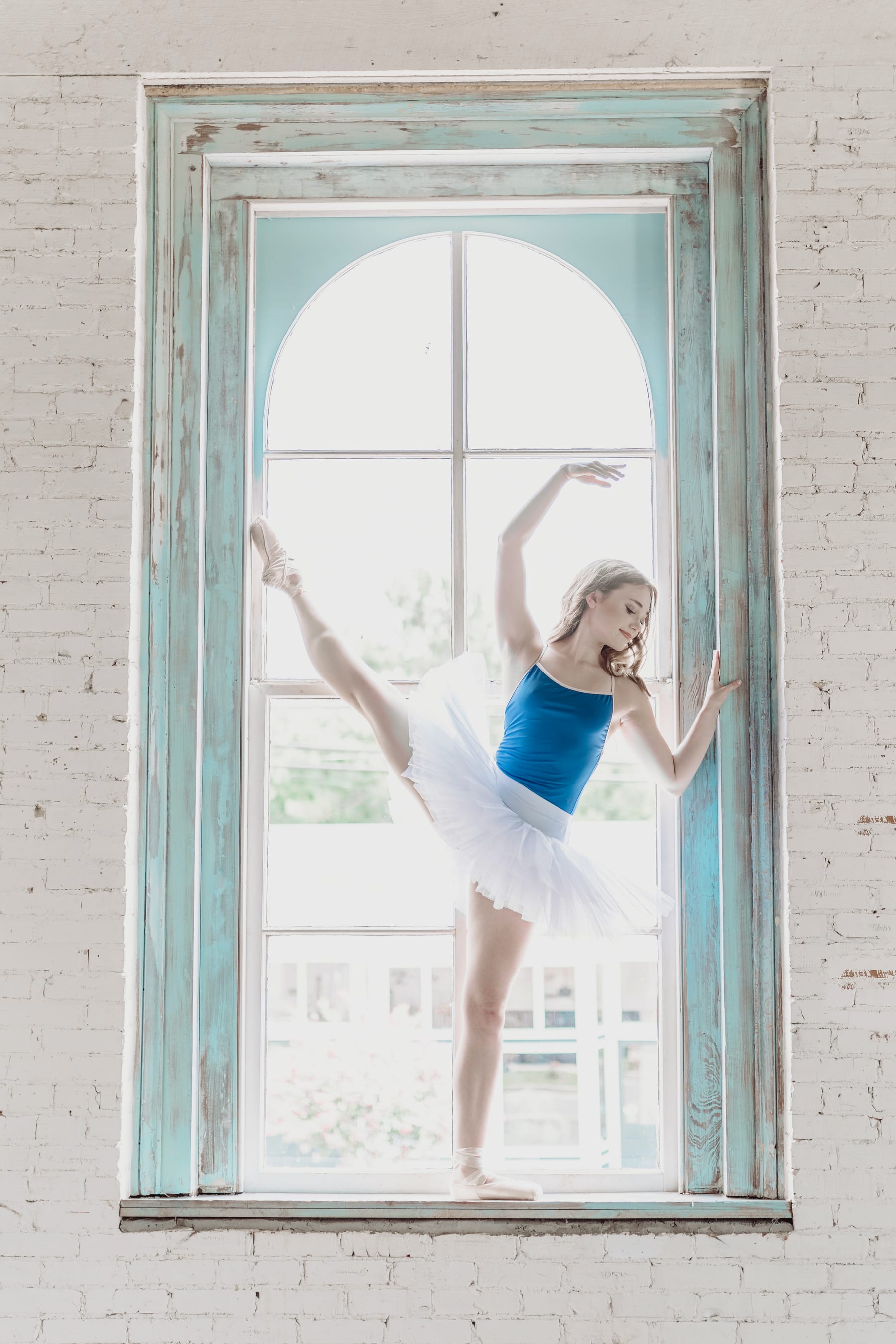 Crawford by a window in natural light